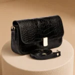 کیف دوشی/کراس‌بادی زنانه چرم طبیعی (طرح کروکو - رنگ مشکی)